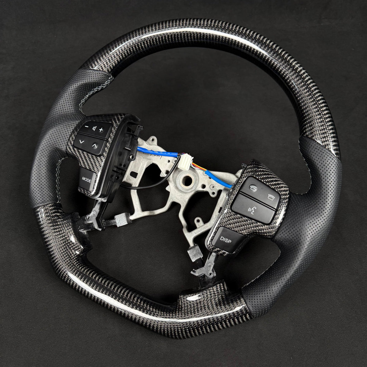 Premium Steering Wheel - Suitable for use with Toyota LandCruiser 200 Series 2008-2015 Genuine Perforated Leather & Carbon Fiber - Tech4tourers