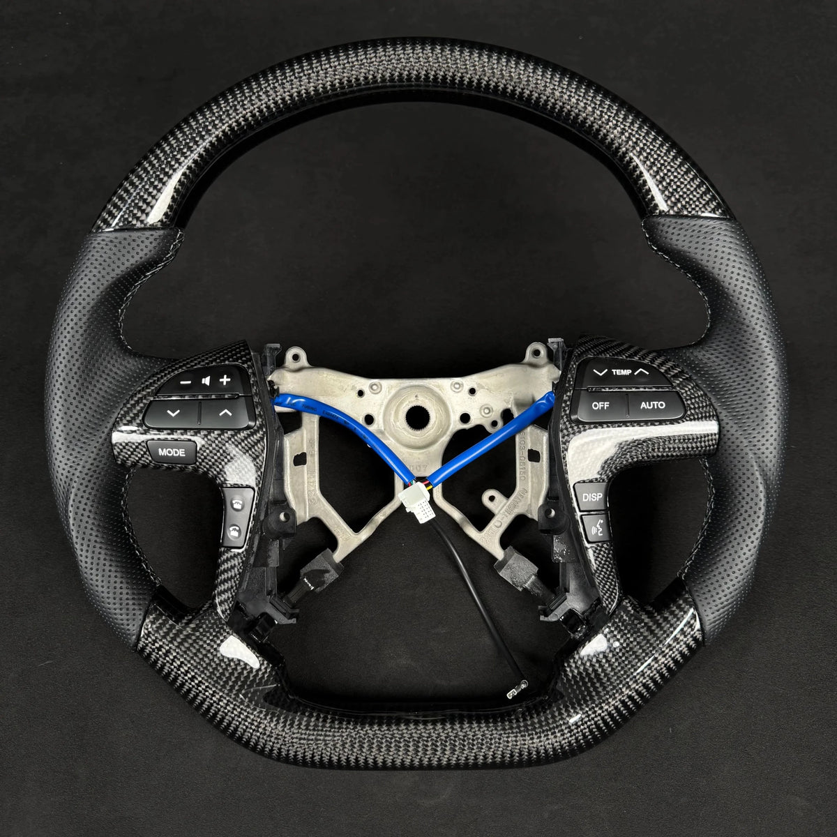 Premium Steering Wheel - Suitable for use with Toyota Hilux N70 2011-2015 Genuine Perforated Leather & Carbon Fiber - Tech4tourers