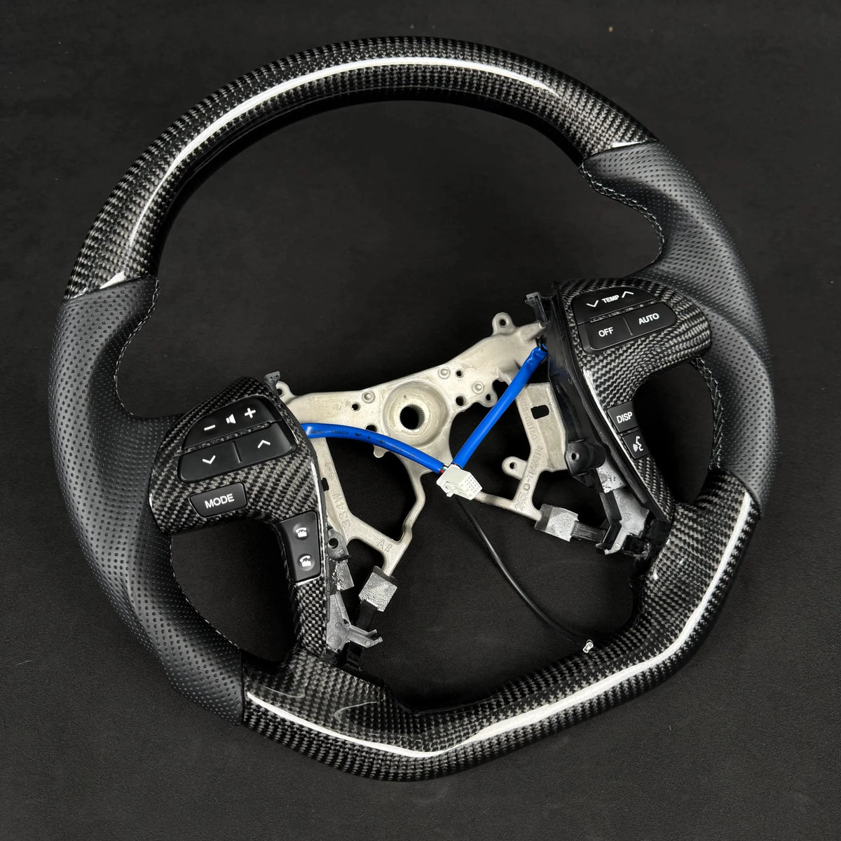 Premium Steering Wheel - Suitable for use with Toyota Hilux N70 2011-2015 Genuine Perforated Leather & Carbon Fiber - Tech4tourers