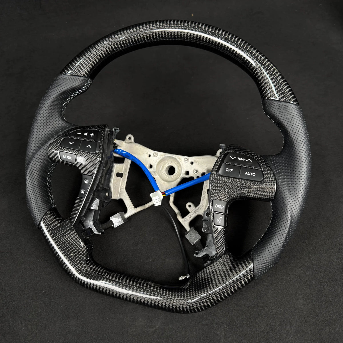 Premium Steering Wheel - Suitable for use with Toyota Hilux N70 2011-2015 Genuine Perforated Leather & Carbon Fiber - Tech4tourers