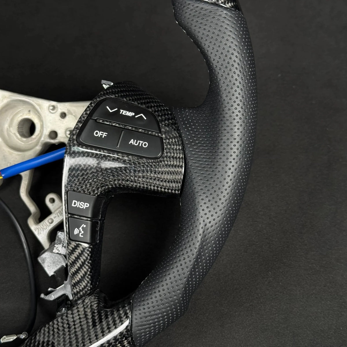 Premium Steering Wheel - Suitable for use with Toyota Hilux N70 2011-2015 Genuine Perforated Leather & Carbon Fiber - Tech4tourers