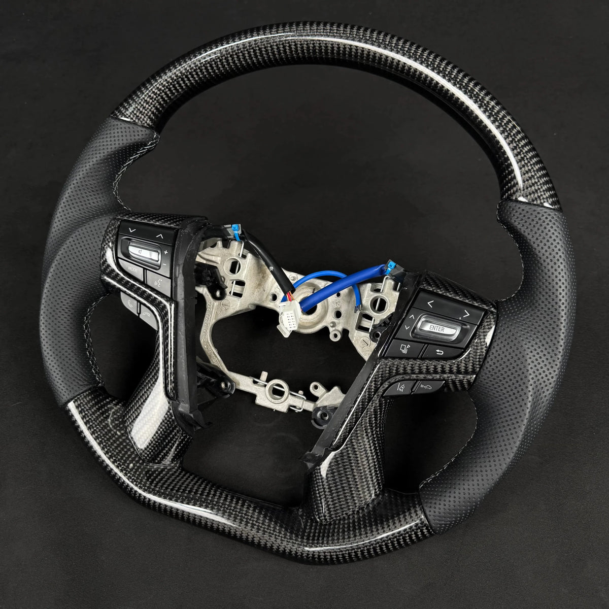 Premium Steering Wheel - Suitable for use with Toyota LandCruiser 200 series 2015 - 2021 Genuine Perforated Leather & Carbon Fiber - Tech4tourers