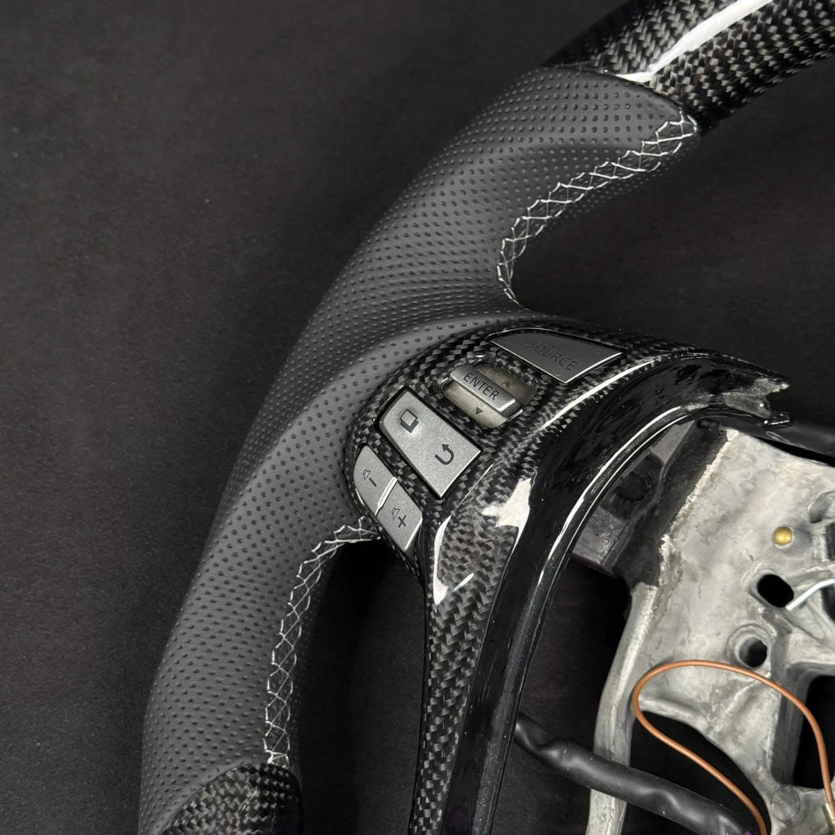 Nissan Navara Np300/D23 Premium Steering Wheel - Genuine Perforated Leather & Carbon Fiber - Tech4tourers