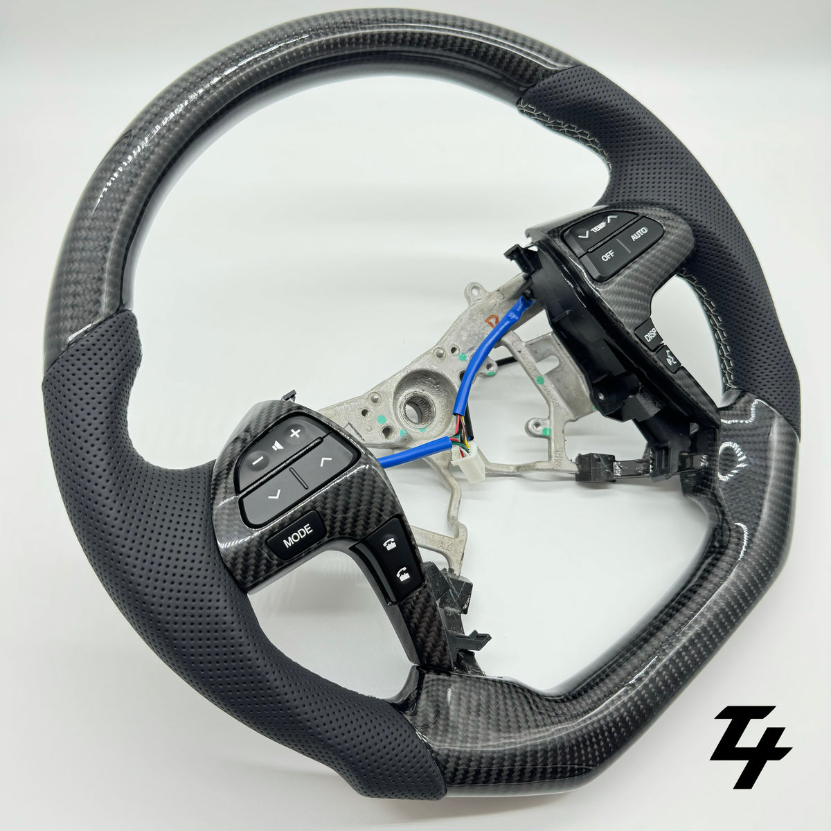 Premium Steering Wheel - Carbon Fiber / Perforated Leather suitable for use with Toyota Hilux N70 2011-2015