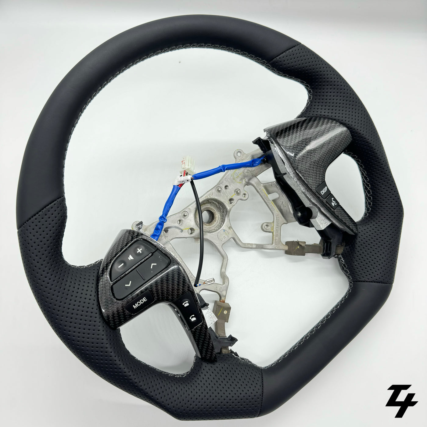 Toyota Hilux N70 Steering wheel - Perforated leather (Side view - Product photo)