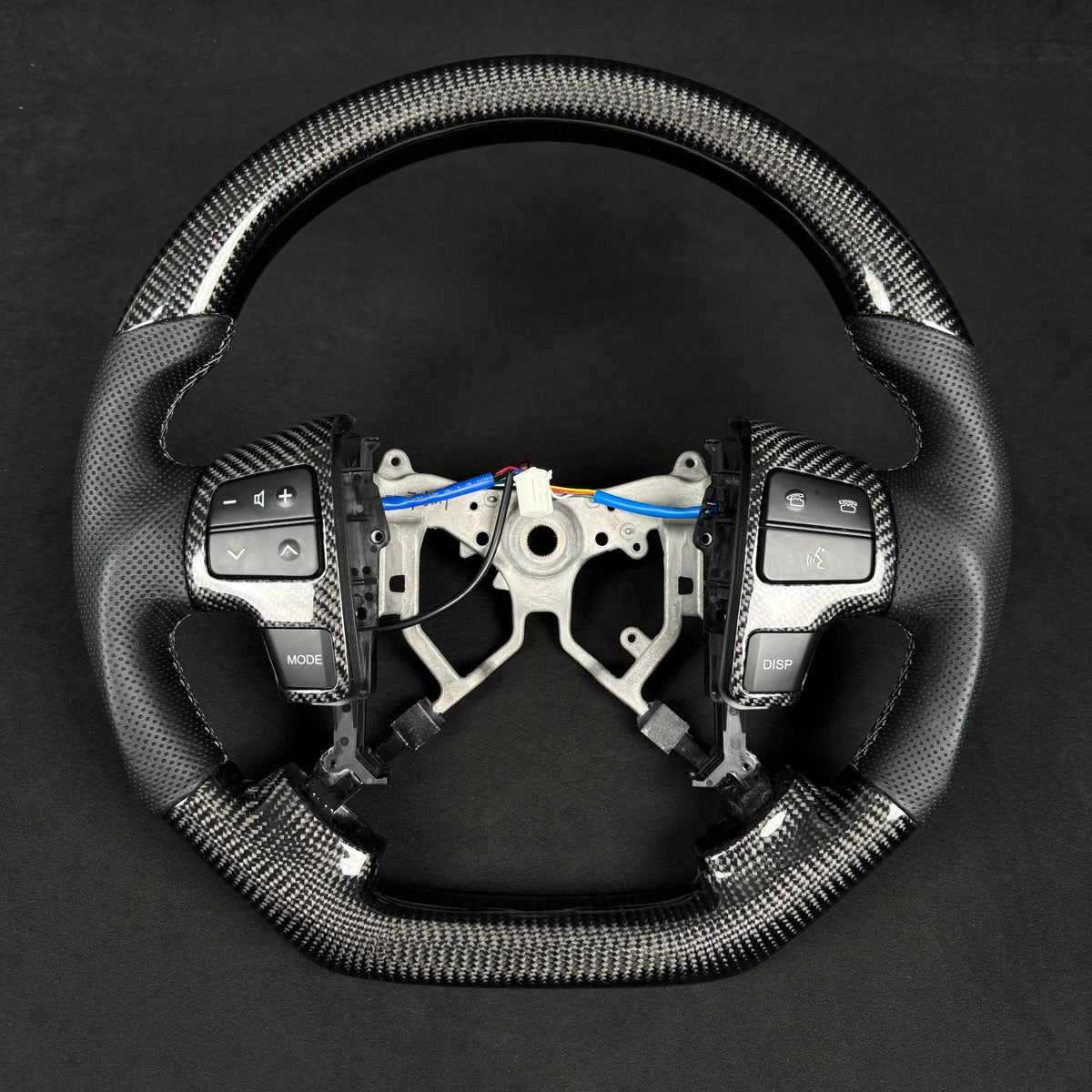 Premium Steering Wheel - Suitable for use with Toyota LandCruiser 200 Series 2008-2015 Genuine Perforated Leather & Carbon Fiber - Tech4tourers