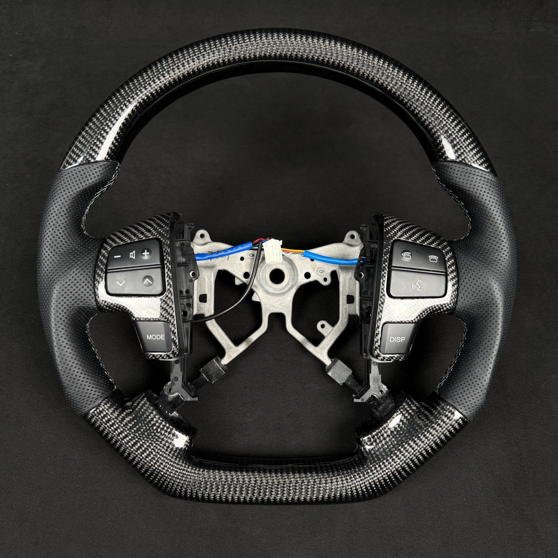Premium Steering Wheel - Suitable for use with Toyota LandCruiser 70 Series 2007-2023 Genuine Perforated Leather & Carbon Fiber - Tech4tourers