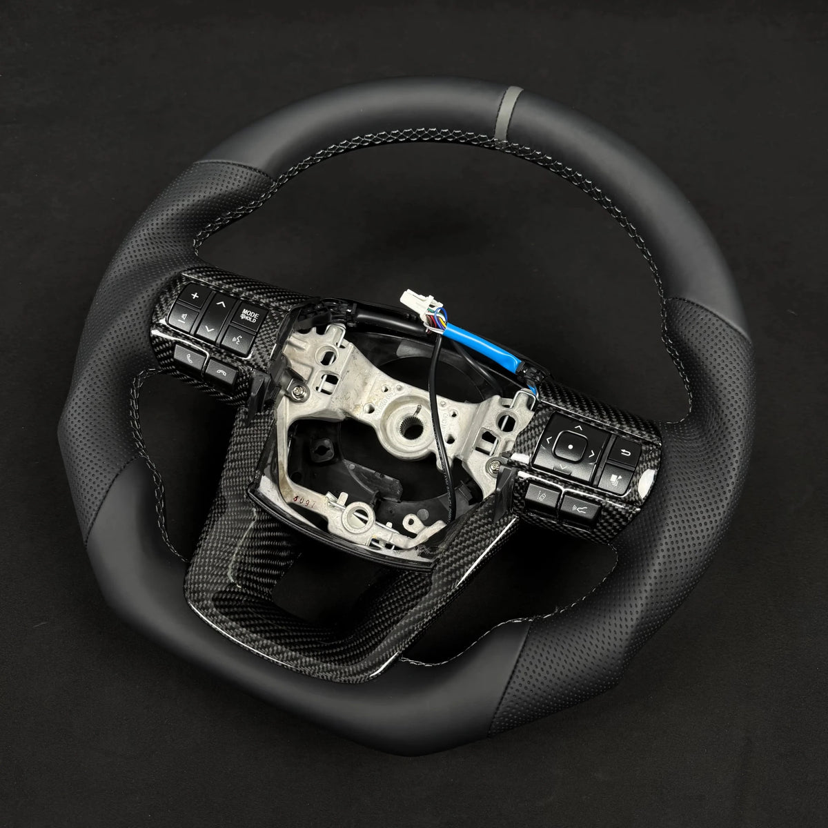 Premium Steering wheel - Suitable for use with Toyota Hilux N80 2015-2026 Genuine Leather + Centre Stripe - Tech4tourers