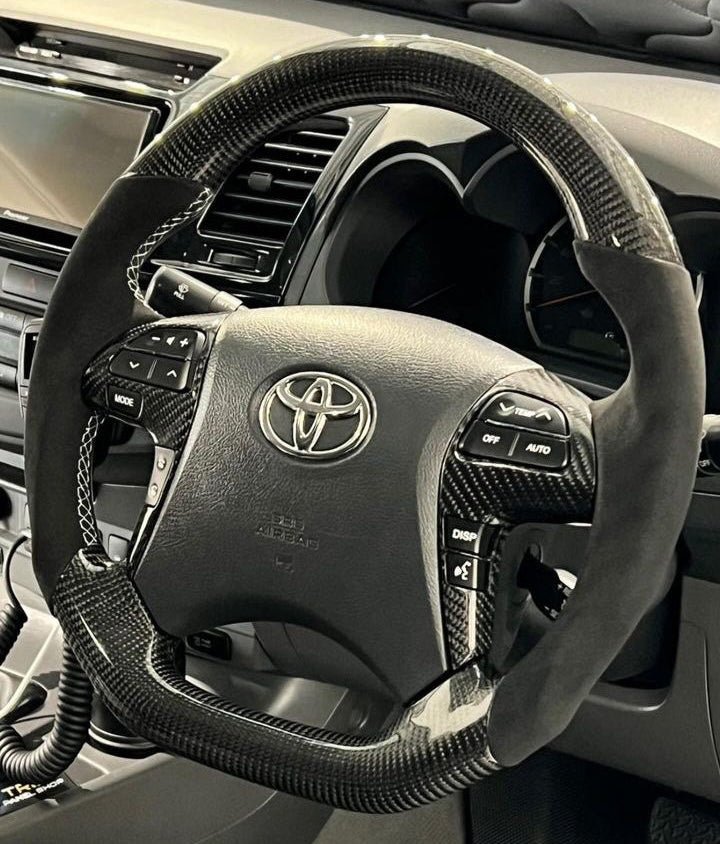 Premium Steering Wheel - Carbon Fiber / Alcantara suitable for use with Toyota Hilux N70 2011 - 2015 - Tech4tourers