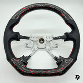 NISSAN GU PATROL Y61 PREMIUM STEERING WHEEL - GENUINE FORGED CARBON (RED FLAKE)