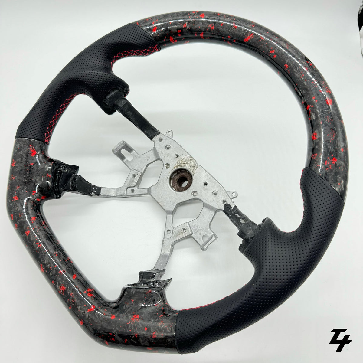 NISSAN GU PATROL Y61 PREMIUM STEERING WHEEL - GENUINE FORGED CARBON (RED FLAKE) - Tech4tourers