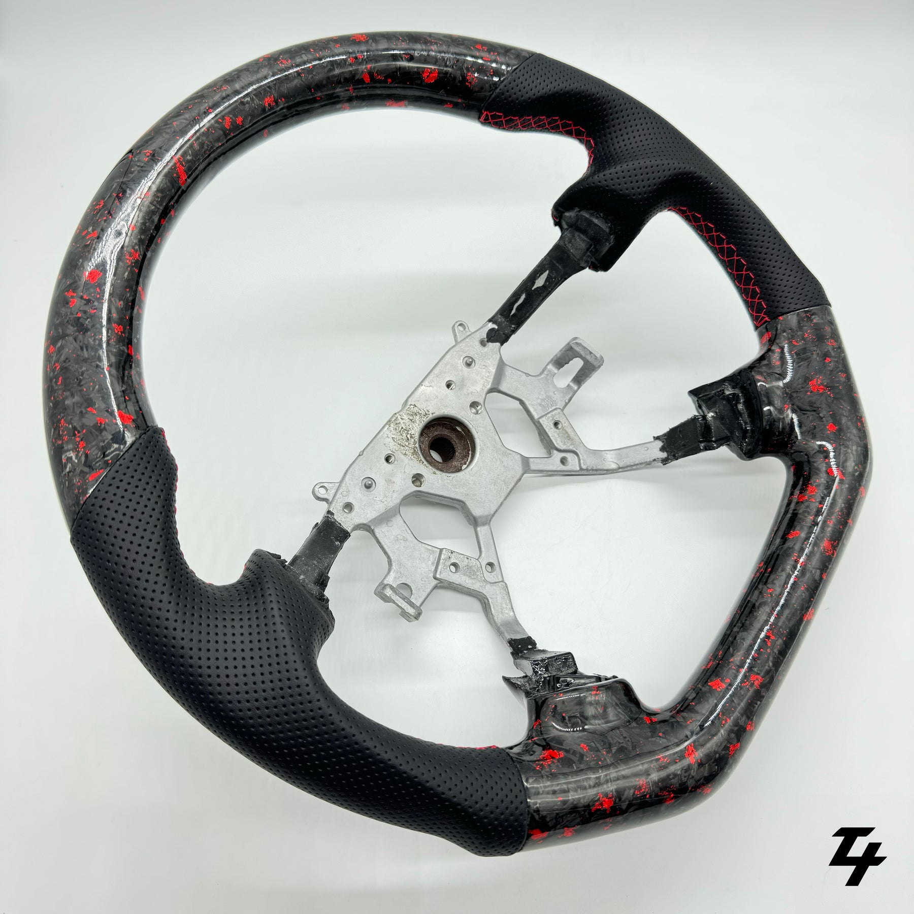 NISSAN GU PATROL Y61 PREMIUM STEERING WHEEL - GENUINE FORGED CARBON (RED FLAKE)
