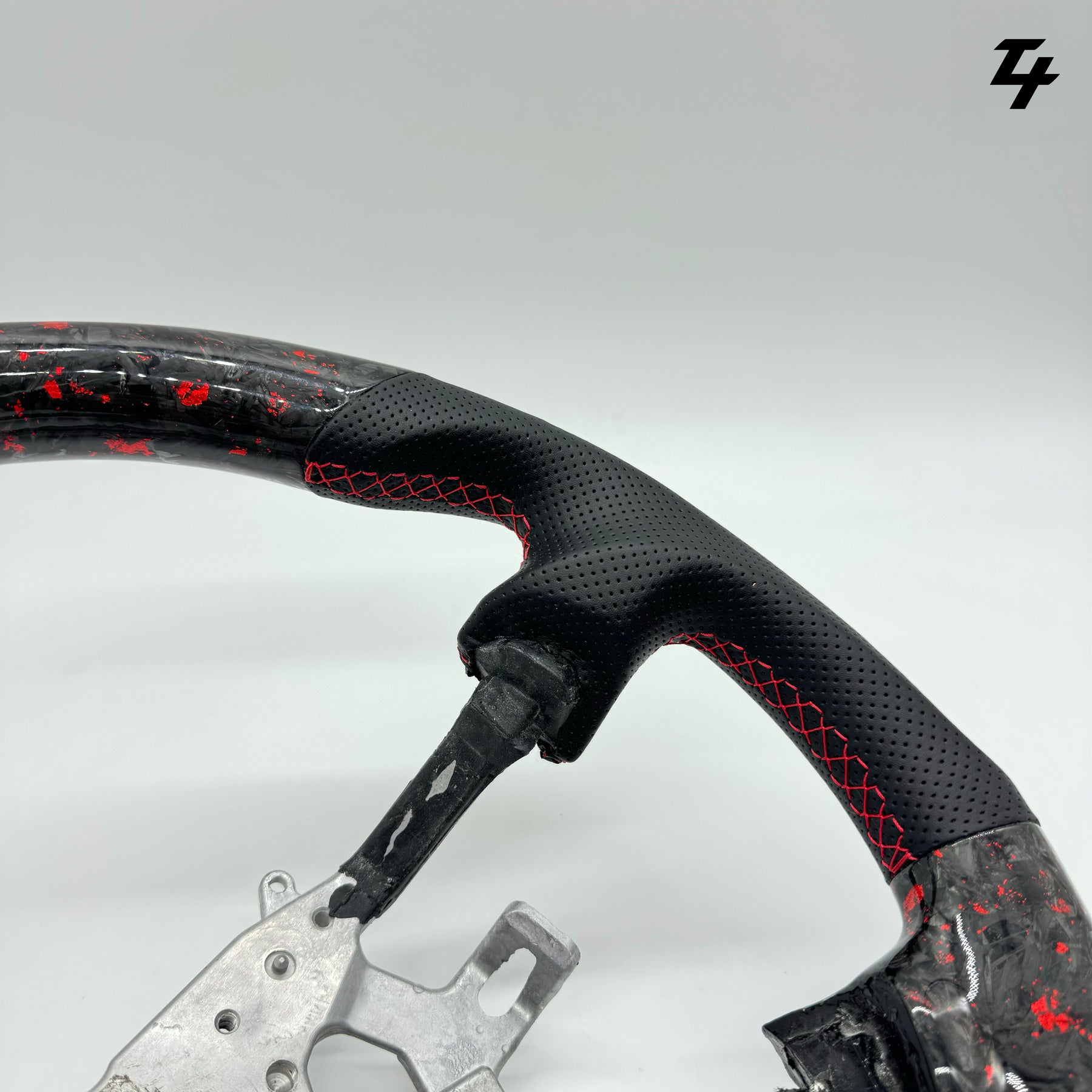 NISSAN GU PATROL Y61 PREMIUM STEERING WHEEL - GENUINE FORGED CARBON (RED FLAKE)