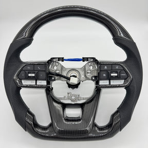 Premium Steering Wheel - Suitable for use with Toyota LandCruiser 300 series 2022 - 2026 Genuine Perforated Leather & Carbon Fiber