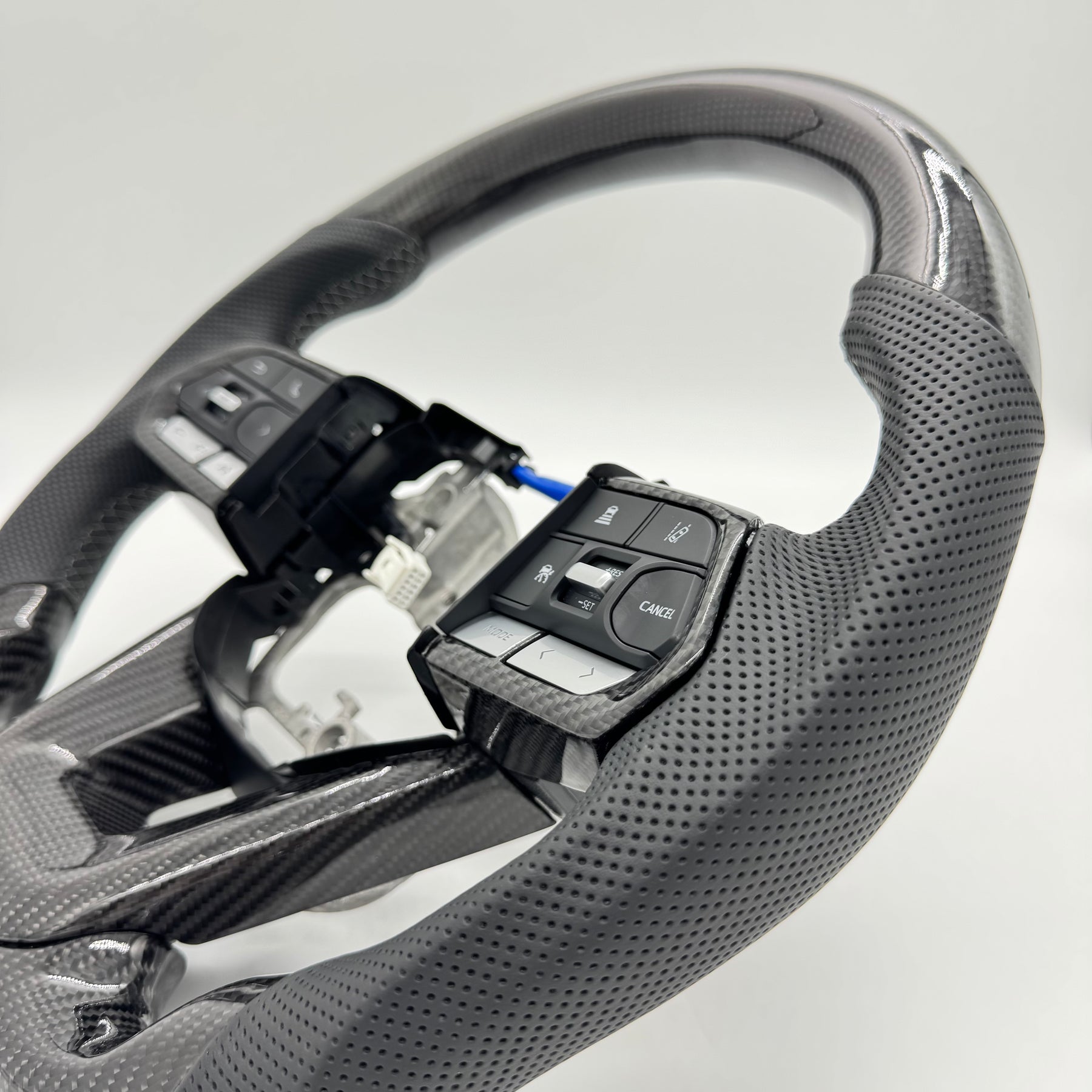 Premium Steering Wheel - Suitable for use with Toyota LandCruiser 300 series 2022 - 2026 Genuine Perforated Leather & Carbon Fiber