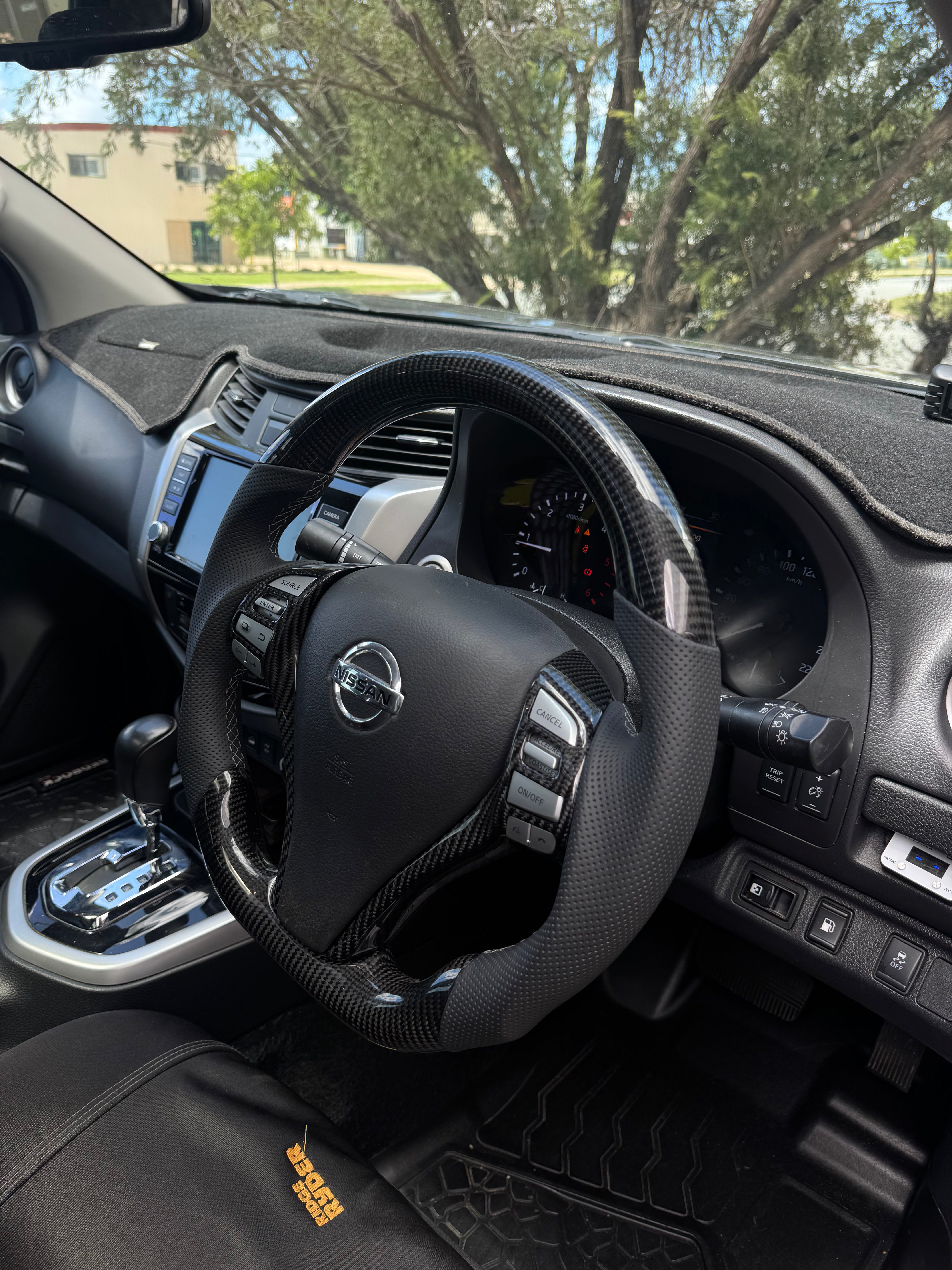 Nissan Navara NP300/D23 Premium Steering Wheel – Genuine Perforated Leather & Carbon Fibre
