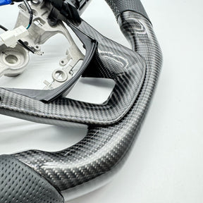 Premium Steering Wheel- Carbon Fiber / Perforated leather suitable for use with Toyota LandCruiser 70 series 2024-On
