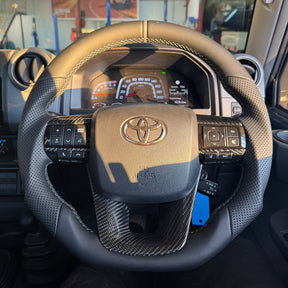 Premium Steering Wheel - Suitable for use with Toyota LandCruiser 70 2024 - 2026 Genuine Leather + Centre Stripe - Tech4tourers